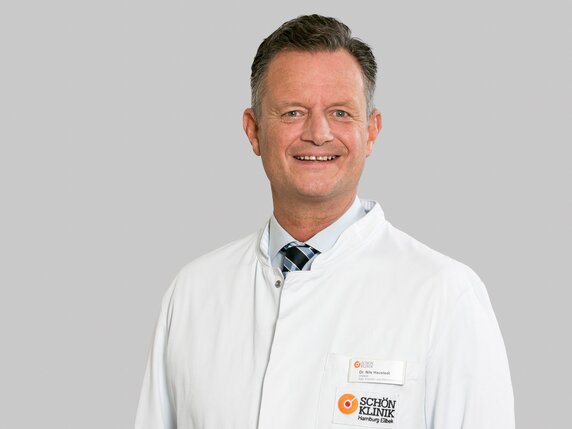Dr. Nils Haustedt