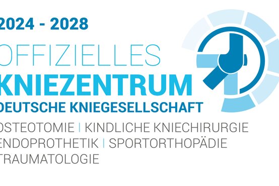 Offizielles Siegel „2024–2028 Offizielles Kniezentrum Deutsche Kniegesellschaft“ mit blauem Kniegelenk-Logo