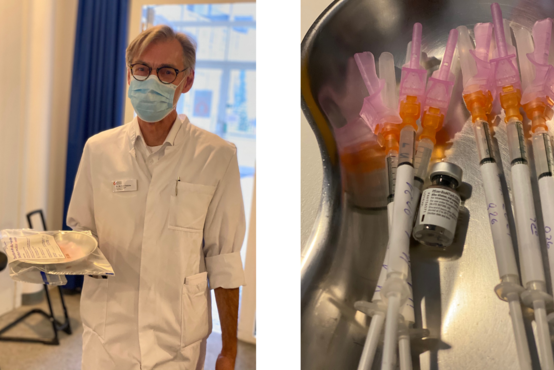 Links steht eine Person im weißen Kittel mit Mund-Nasen-Schutz, rechts liegen auf einer Nierenschale mehrere aufgezogene Spritzen