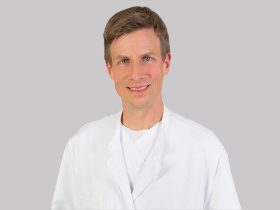 Dr. Tim Eiser