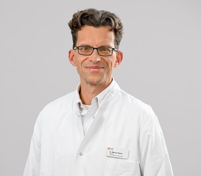Dr. Marius E. Skasa