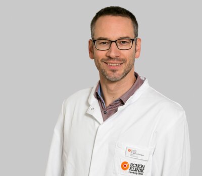 Dr. Simon Tiedgen