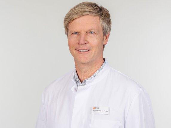 Dr. Michael Poschmann