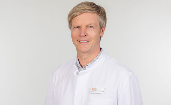 Dr. Michael Poschmann