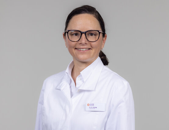 Dr. Nadine Herzig