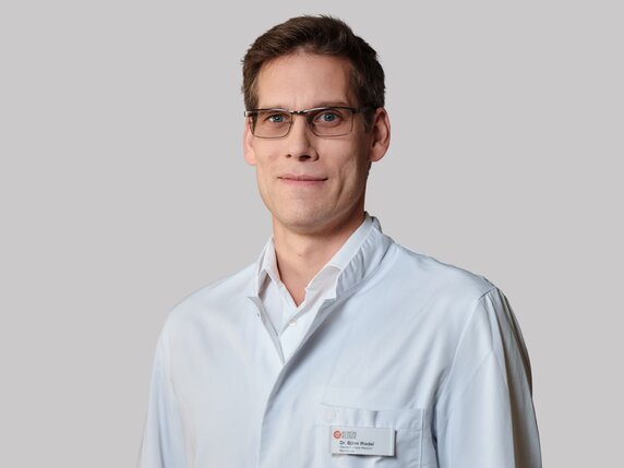 Dr. Björn Riedel