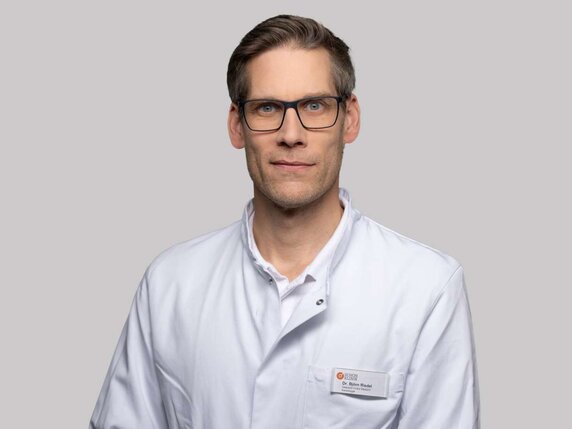 Dr. Björn Riedel