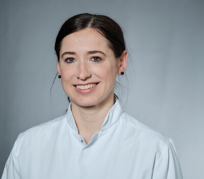 Dr. Elena Hensler