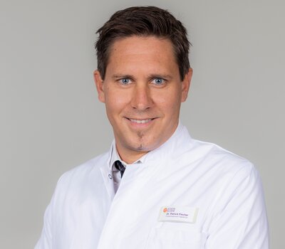 Dr. Patrick Fischer